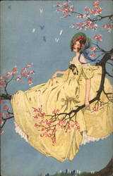 Woman in large flowing yellow dress sits on tree branch Postcard
