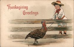 Thanksgiving Greetings, boy at fence with turkey on a leash Postcard