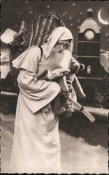 Santa in White Robe with Toys Postcard