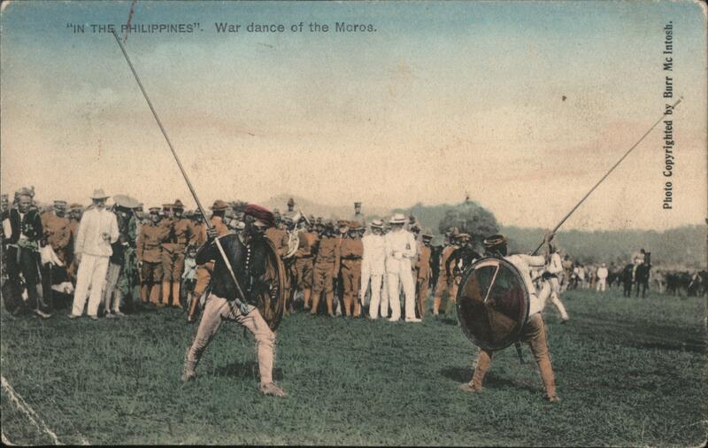 In the Philippines. War dance of the Moros. Southeast Asia