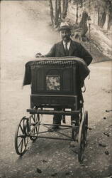 Man With Street Organ Postcard