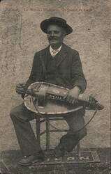 Le Morvan Rustique Hurdy Gurdy Player Postcard