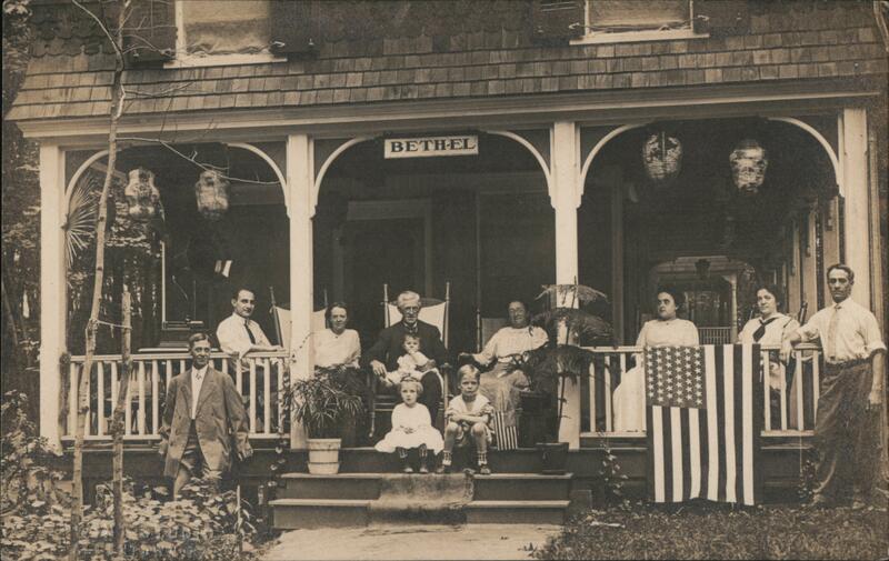 Bethel Porch Family Portrait with Flag Patriotic