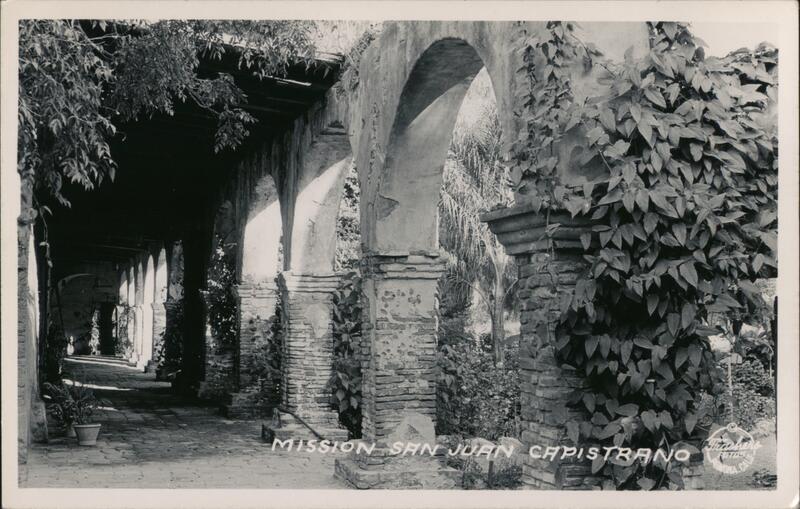 Mission Exterior Arches and Foliage San Juan Capistrano California