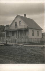 House on Dirt Street Postcard