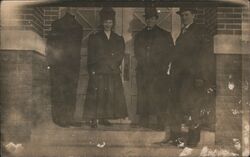 Group Gathered In Front of Brick Building Postcard