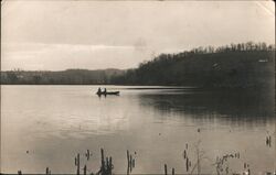 Canoe floating on Ohio River Postcard