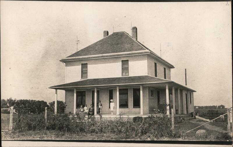 Family Posing on Farmhouse Porch Madison Nebraska