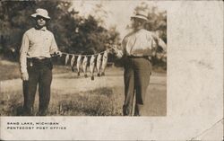 Couple Holding String of Fish, Sand Lake, Michigan Postcard