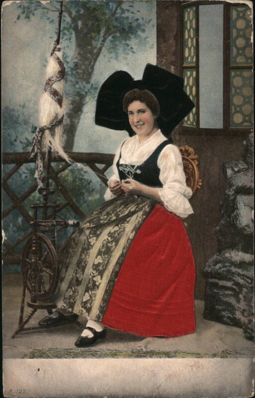 Woman in Traditional Dutch Costume with Spinning Wheel