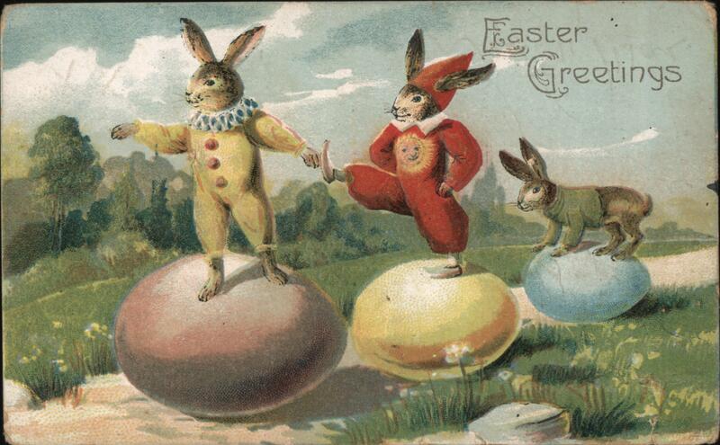 Three Rabbits Balancing on Easter Eggs With Bunnies