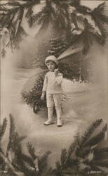 Boy Carrying Christmas Tree, Snowy Winter Scene Postcard