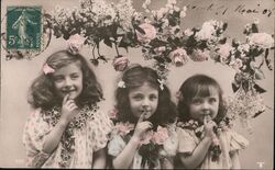 Three Girls with Flowers, Fingers on Lips Postcard