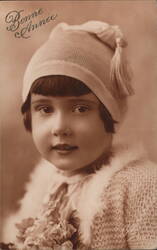 Bonne Annee, Girl in Knit Cap with Flowers Postcard