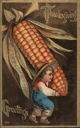Boy Carrying Giant Corn Thanksgiving Greetings Postcard, IA Postcard