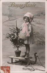 Bonne Année: Girl with Christmas Tree on Sled, Vintage French Postcard Postcard
