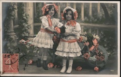 Two Girls with Wheelbarrow of Flowers, France - Colorized Vintage Postcard Postcard