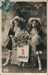 Two Girls with Bonne Annee New Year Postcard, 1 Janvier Postcard