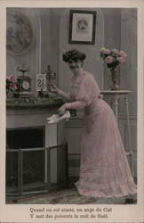 Woman Setting Christmas Eve Date on Perpetual Calendar Postcard