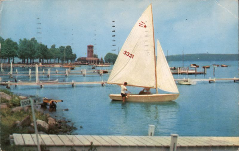 Sailboat on Chautauqua Lake with Miller Bell Tower New York