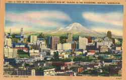 A view of the Main Business District with Mt. Rainier in the Background Postcard