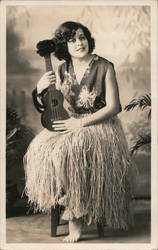 Woman with Ukulele in Grass Skirt Studio Photo Postcard