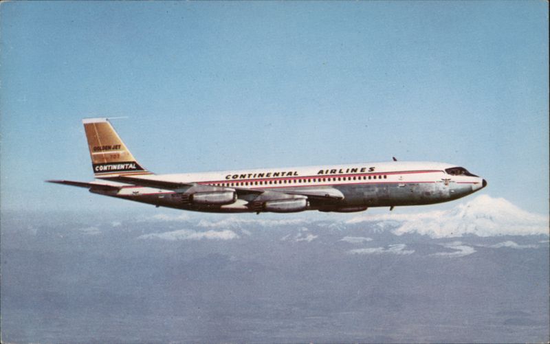 Continental's Golden Jet Boeing 707 over Mt Rainier