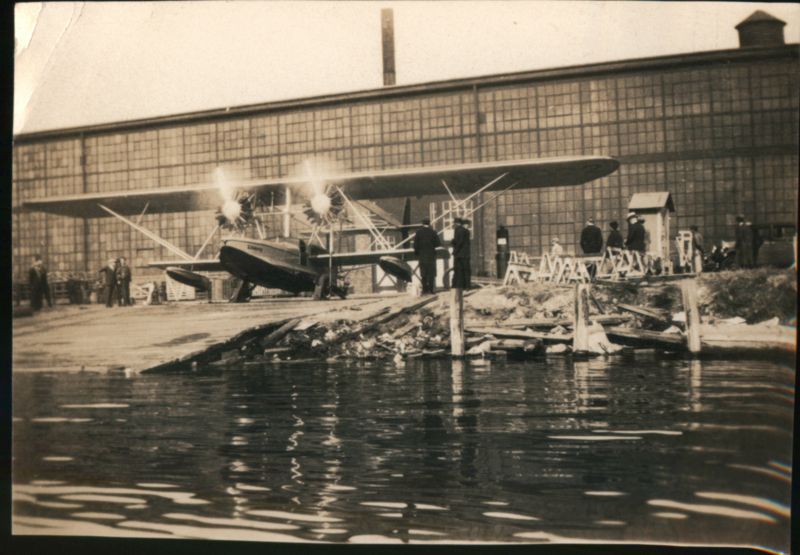 Seaplane Docked at Hangar Aircraft