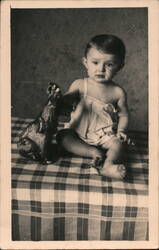 Baby with Toy Dog Postcard