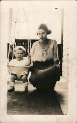 Mother and Child on Swing Postcard