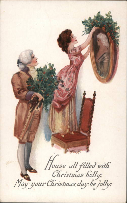 Couple Decorating House with Holly Christmas