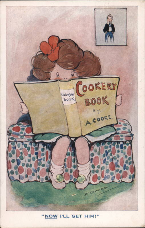 Little girl sitting on a padded bench reading a book