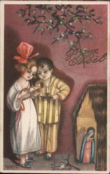 Children Holding a baby near manager under the mistletoe Postcard