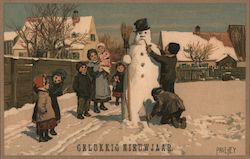 Family building a snowman in the yard Postcard