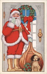 Santa Claus Standing in Front of Door with Wreath Postcard