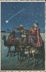 The three wise men hold their gifts while seated on camels Postcard