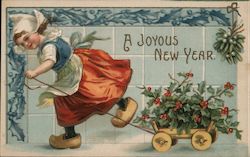 A Joyous New Year - Girl pulling wagon of Holly Postcard