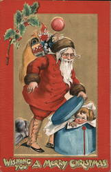 Santa Claus Opening a Gift with a Child Inside Postcard