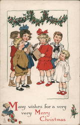 Children singing underneath Holly Postcard