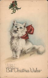 White fluffy cat in a red bow underneath mistletoe Postcard