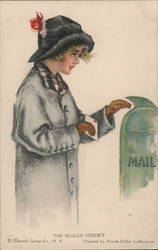 Woman in grey coat and black hat with red feather is putting a letter in a green mailbox Postcard