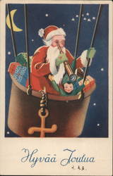 Santa in an Air Balloon looking through a telescope Postcard