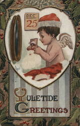 Yuletide Greetings Cherub with Santa Mask Postcard
