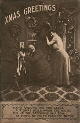 Xmas Greetings, Couple Hanging Stockings by Fireplace Postcard