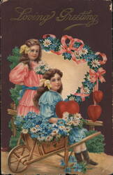 Loving Greeting - Girls with Wheelbarrow, Flowers, and Hearts Postcard