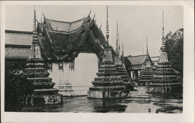 Ornate Temple Gateway with Stupas Religious