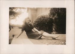 Woman Sitting on Wall Outdoors Original Photograph