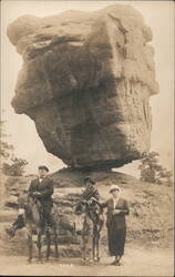 Family on Donkeys, Balanced Rock, Manitou Postcard