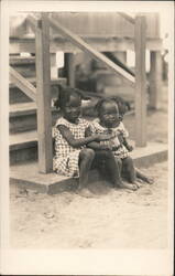 Three Young Black Children Sitting on Steps Postcard