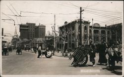 Wheel Barrows on City Street Postcard